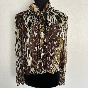 Animal print semi sheer blouse with Tie.